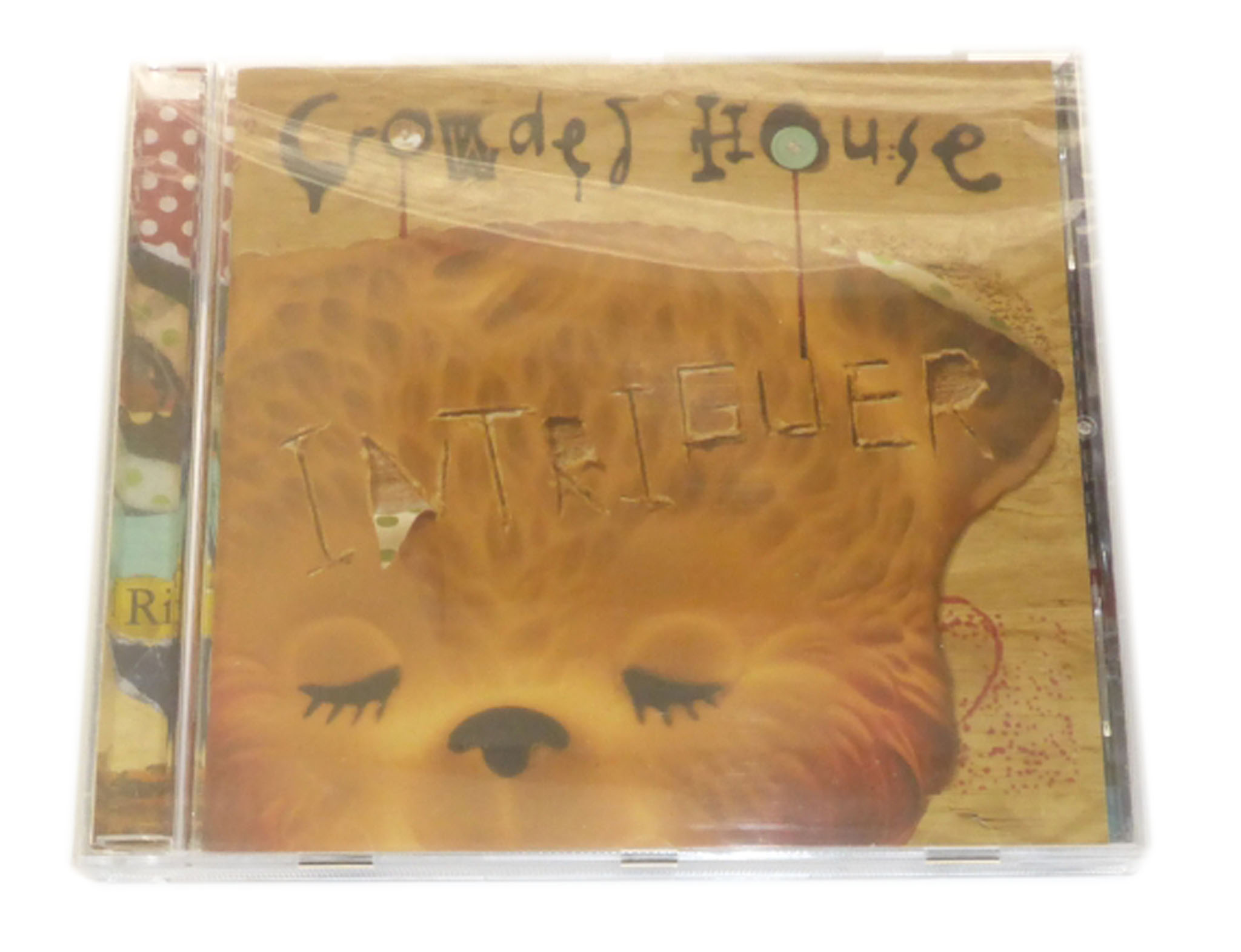 Crowded House Intrigeur (sklep) folia