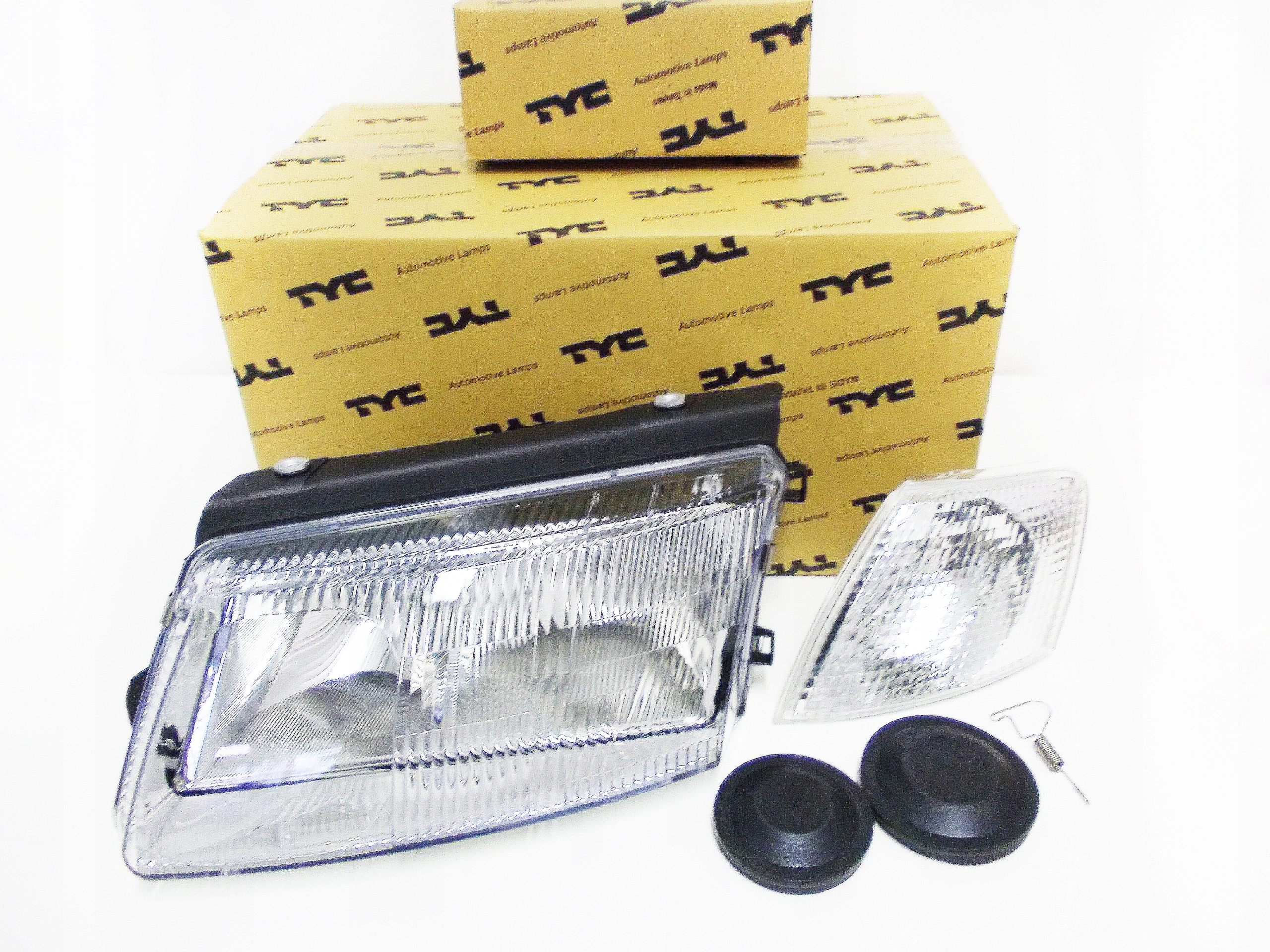 REFLEKTORY + MIG. LAMPY H4+H7 PASSAT B5 96-00 TYC Strona zabudowy prawa