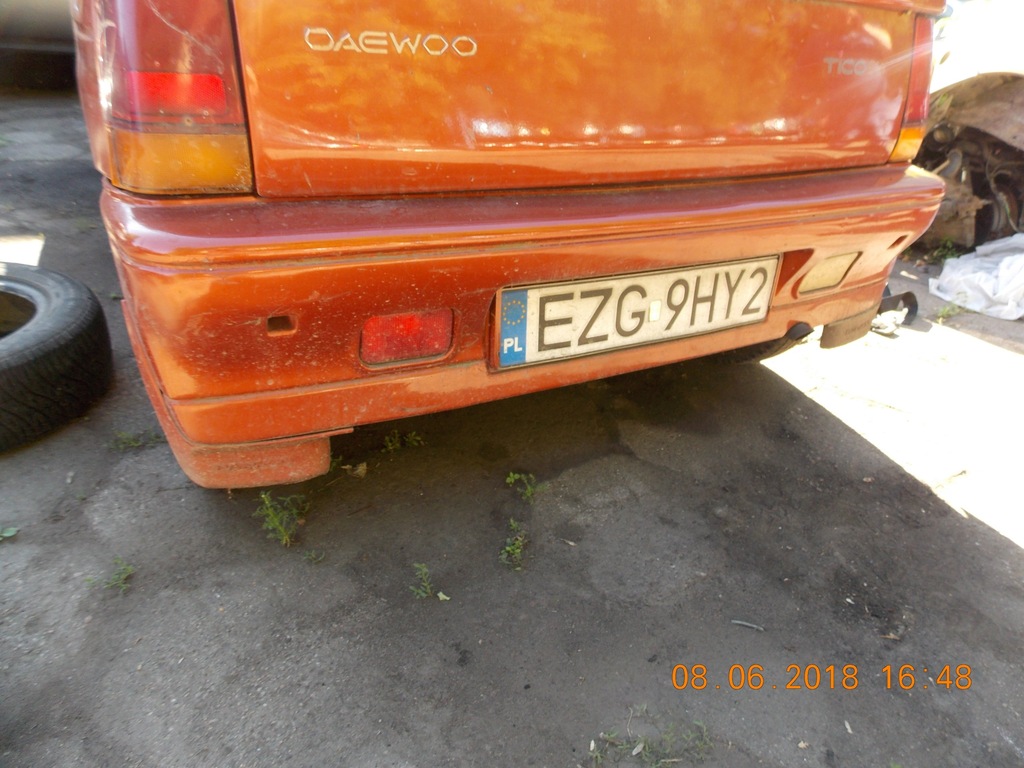 ZDERZAK TYLNY DAEWOO TICO POMARAŃCZOWY LAMPY