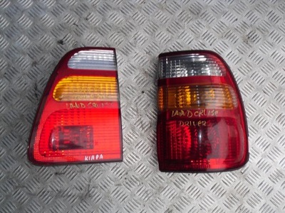 Toyota land cruiser лампа задня права 98-02 фото №1