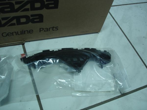 фото №1, Mazda 3 2009-2013 напрямна бампера перед лівий